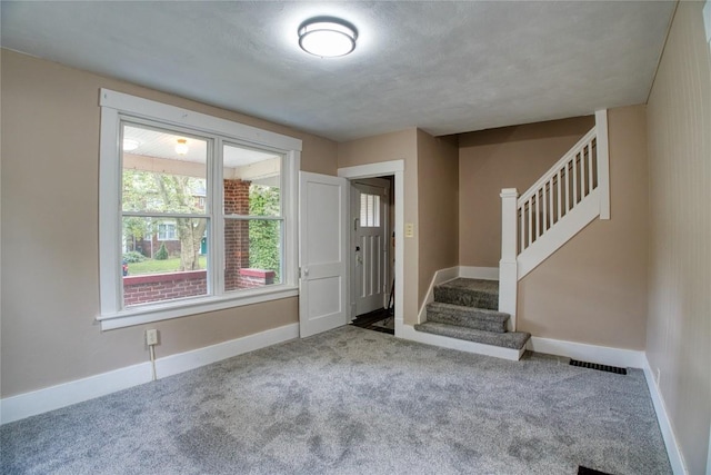1032 Newton Ave, Erie, PA 16511 - entryway featuring stairs and carpet