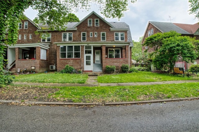 1032 Newton Ave, Erie, PA 16511 - view of property featuring brick siding and a front lawn