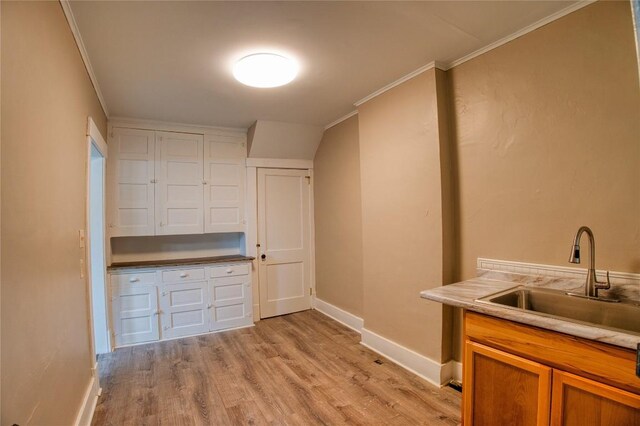 1032 Newton Ave, Erie, PA 16511 - laundry area with light wood finished floors and ornamental molding