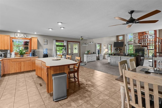 11221 W Greene Rd, Waterford, PA 16441 - kitchen featuring a center island, ceiling fan, open floor plan, light tile patterned floors, and recessed lighting