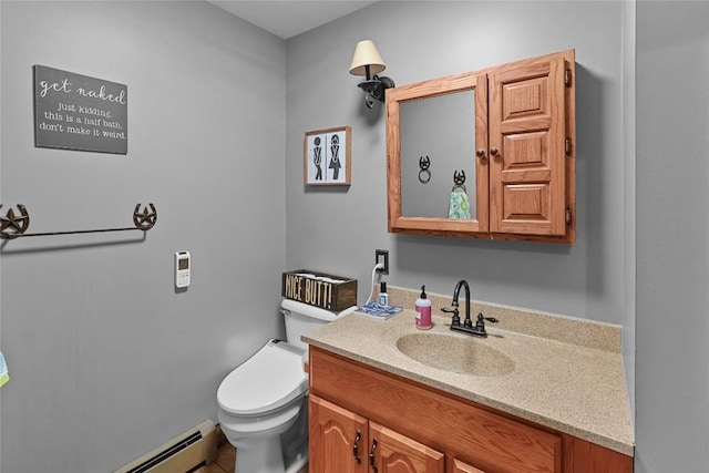 11221 W Greene Rd, Waterford, PA 16441 - half bathroom with vanity, toilet, and a baseboard heating unit