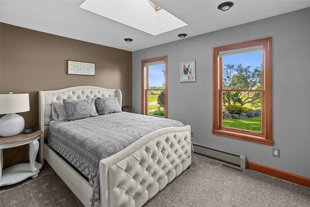 11221 W Greene Rd, Waterford, PA 16441 - bedroom with a baseboard heating unit, a skylight, carpet flooring, and baseboards