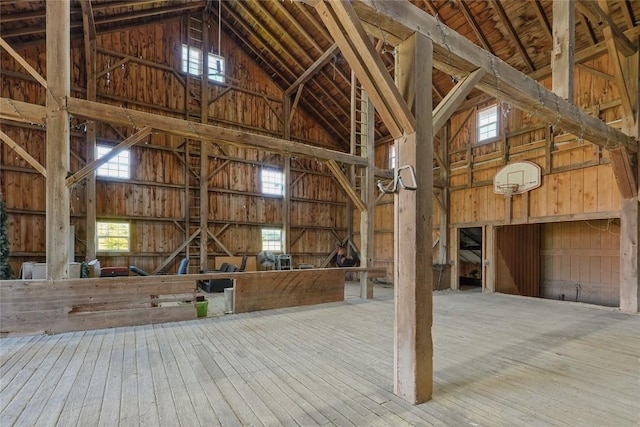 11221 W Greene Rd, Waterford, PA 16441 - miscellaneous room with high vaulted ceiling, healthy amount of natural light, hardwood / wood-style floors, and wooden walls