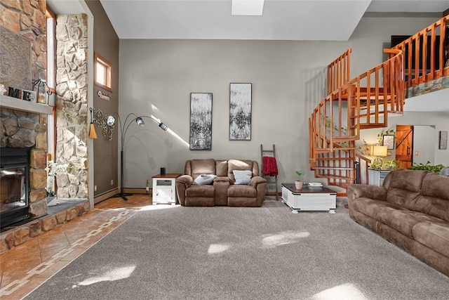11221 W Greene Rd, Waterford, PA 16441 - living room with stairs, a fireplace, and baseboards