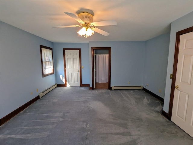 carpeted empty room with ceiling fan and a baseboard radiator