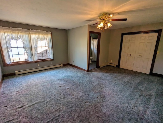 unfurnished bedroom with carpet floors, ceiling fan, a baseboard radiator, connected bathroom, and a closet