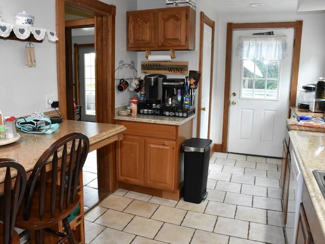 kitchen with light tile patterned floors