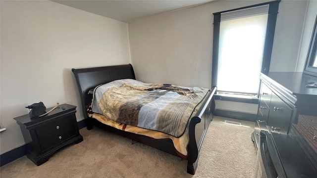 457 E 24th St, Erie, PA 16503 - bedroom with carpet and multiple windows