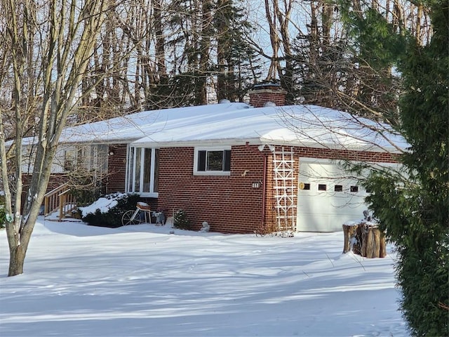 view of front of home featuring a garage