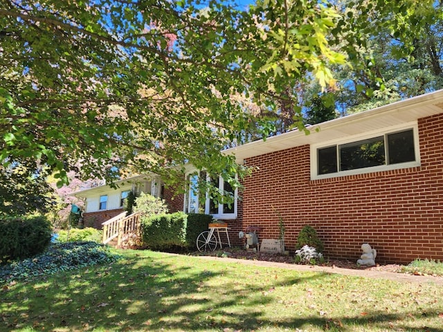 view of property exterior featuring a yard