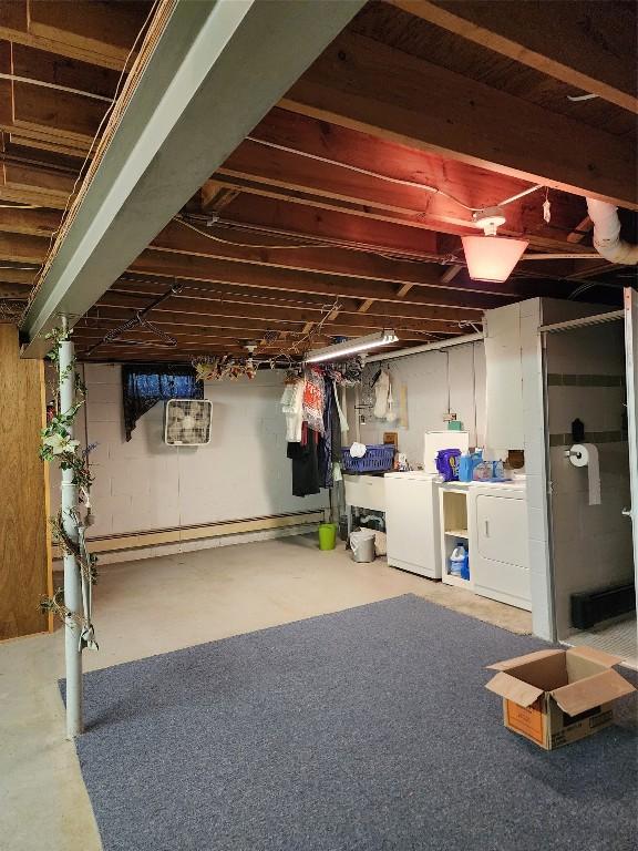 basement with washer and clothes dryer