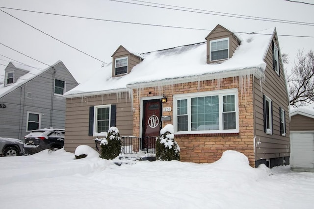 view of new england style home