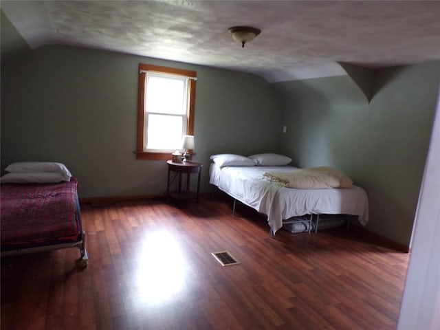 13326 Ridge Rd, West Springfield, PA 16443 - bedroom featuring lofted ceiling, wood finished floors, baseboards, and a textured ceiling
