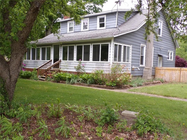 13326 Ridge Rd, West Springfield, PA 16443 - view of front of house with a sunroom and roof with shingles