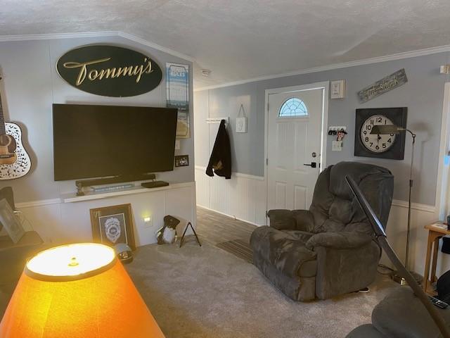 831 Douglas Dr, Erie, PA 16505 - living area with ornamental molding, carpet floors, and a wainscoted wall