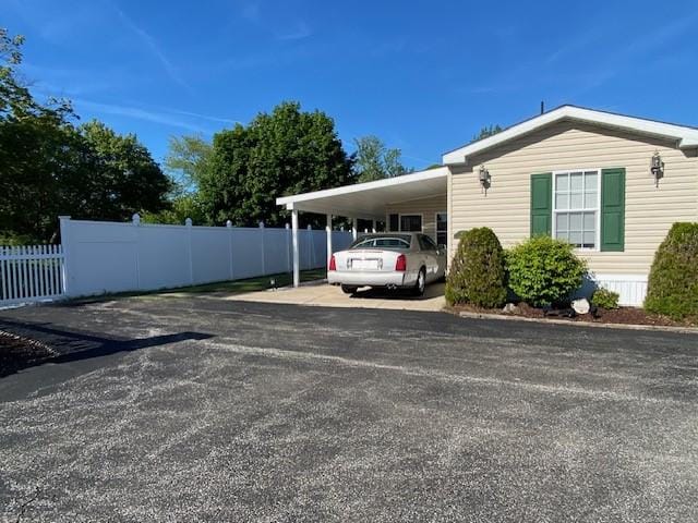 831 Douglas Dr, Erie, PA 16505 - view of parking with a carport and driveway