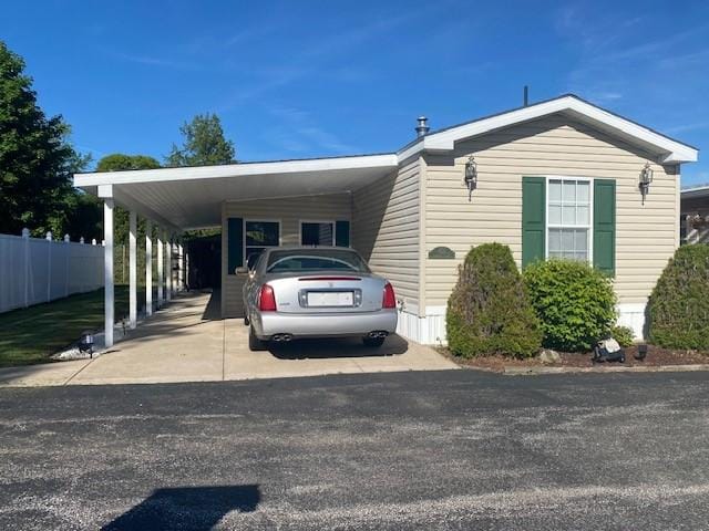 831 Douglas Dr, Erie, PA 16505 - view of front of home featuring an attached carport and concrete driveway
