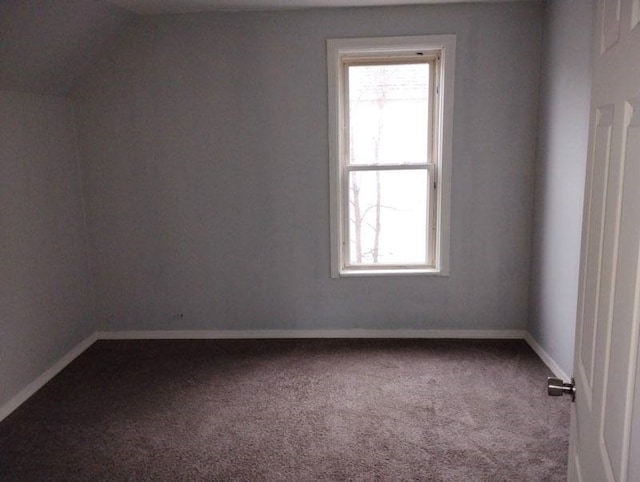 443 E 27 Th St, Erie, PA 16504 - empty room with dark colored carpet, baseboards, and a healthy amount of sunlight