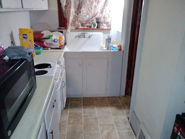 443 E 27 Th St, Erie, PA 16504 - laundry room featuring stone finish floor and laundry area
