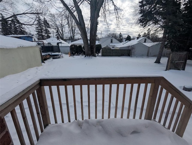 view of snow covered deck