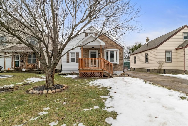 view of front of home featuring brick siding