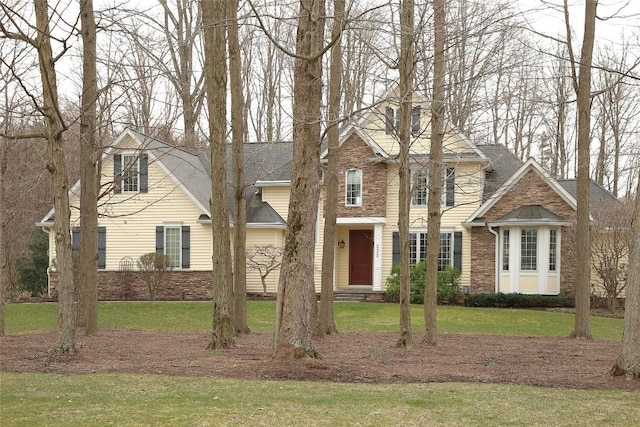 view of front property with a front lawn