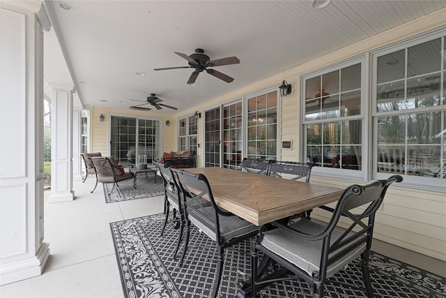 view of patio featuring ceiling fan