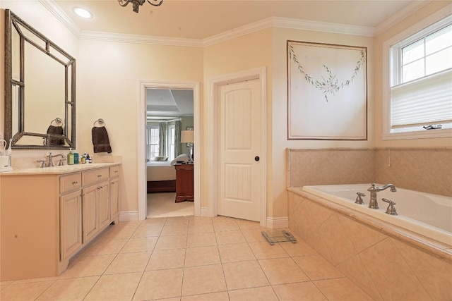 bathroom with tile patterned floors, crown molding, plenty of natural light, and vanity