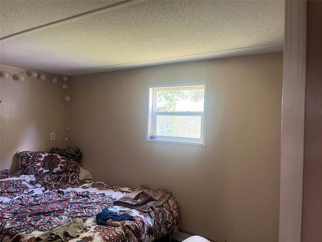 bedroom with a textured ceiling