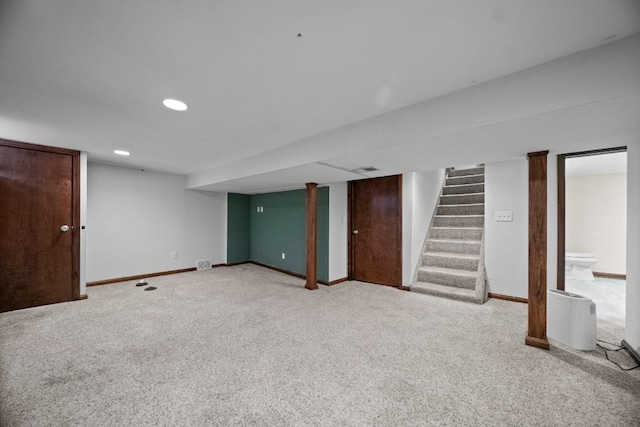 basement with light colored carpet