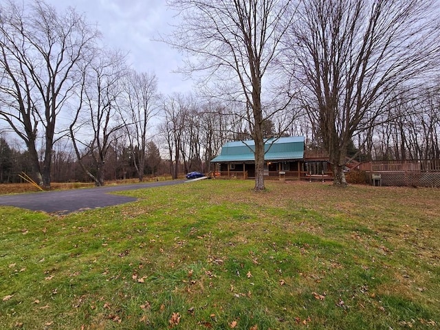 view of yard with a deck