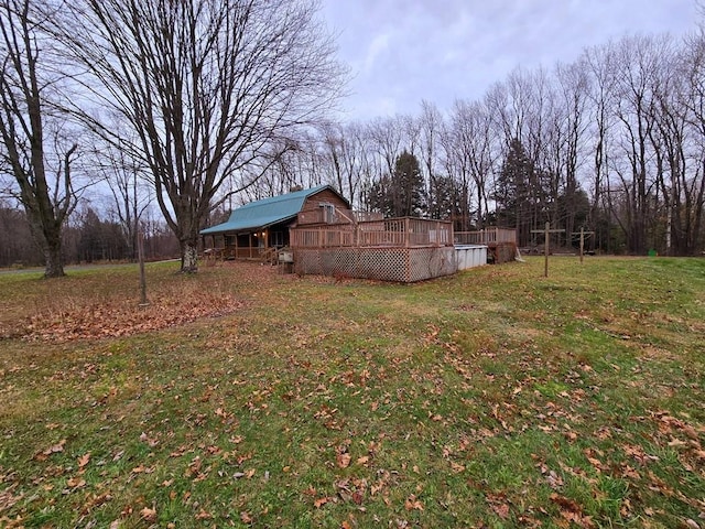 view of yard featuring a wooden deck