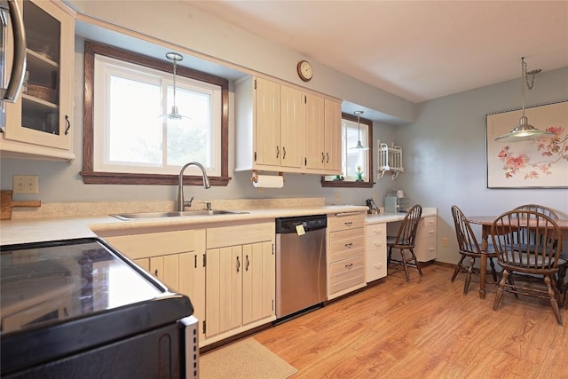 5219 W 52nd St, Fairview, PA 16415 - kitchen featuring dishwasher, black electric range oven, light countertops, and light wood finished floors
