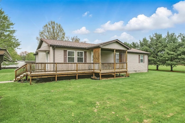 1986 Providence Dr, Jamestown, PA 16134 - rear view of house with a yard, roof with shingles, a wooden deck, and crawl space