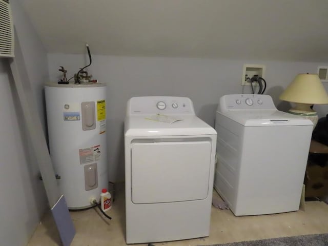 laundry area with electric water heater and washer and clothes dryer