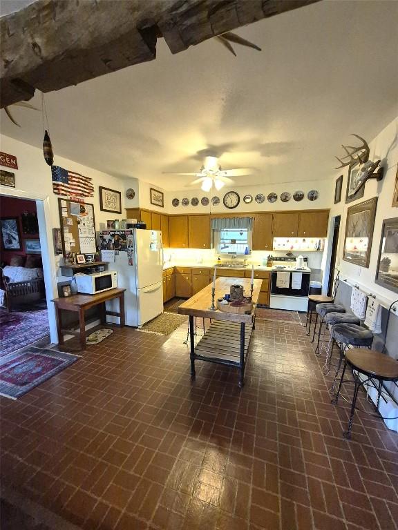23754 S Beaver Rd, Springboro, PA 16435 - living room featuring a ceiling fan and brick patterned flooring
