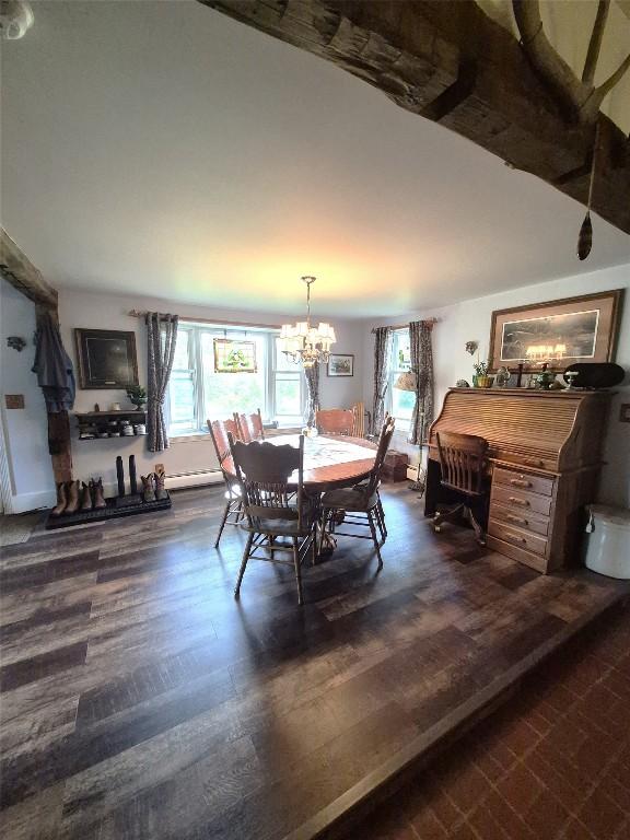 23754 S Beaver Rd, Springboro, PA 16435 - dining room with a chandelier and dark wood finished floors