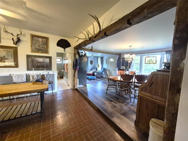 23754 S Beaver Rd, Springboro, PA 16435 - dining room with a chandelier and brick patterned flooring