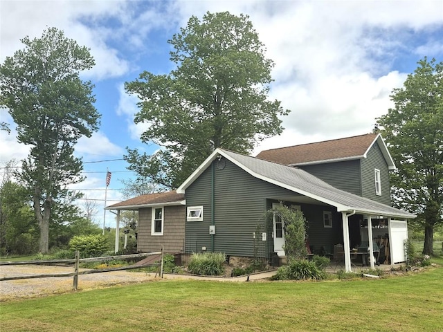 23754 S Beaver Rd, Springboro, PA 16435 - rear view of house with a shingled roof