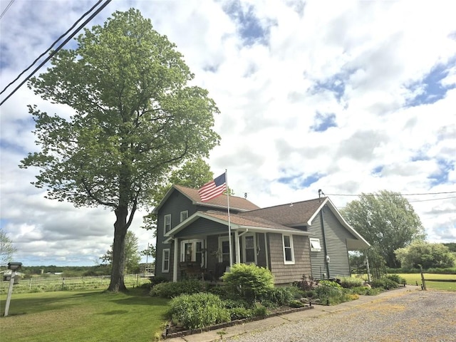 23754 S Beaver Rd, Springboro, PA 16435 - view of home's exterior with a lawn and a shingled roof