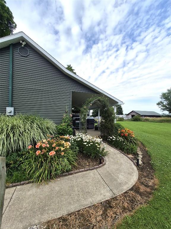 23754 S Beaver Rd, Springboro, PA 16435 - view of property exterior featuring a lawn
