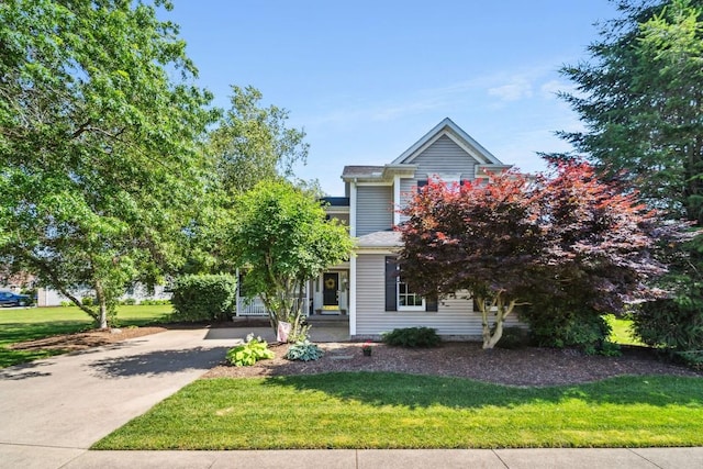 5501 Stone Run Dr, Fairview, PA 16415 - view of property hidden behind natural elements featuring a front lawn and driveway