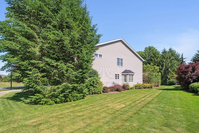 5501 Stone Run Dr, Fairview, PA 16415 - view of home's exterior with a lawn