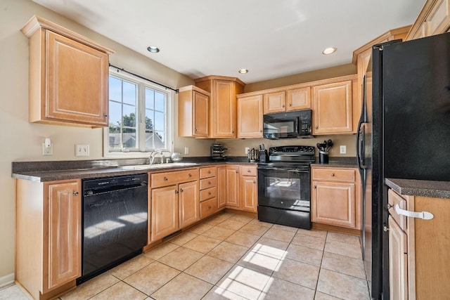 5501 Stone Run Dr, Fairview, PA 16415 - kitchen with black appliances, light brown cabinetry, dark countertops, and recessed lighting