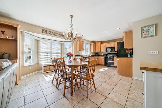 5501 Stone Run Dr, Fairview, PA 16415 - dining room with a chandelier, light tile patterned floors, and recessed lighting