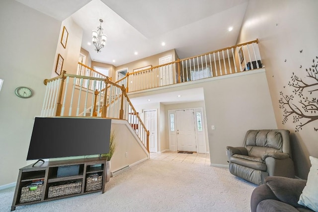 5501 Stone Run Dr, Fairview, PA 16415 - carpeted living area with stairs, a high ceiling, recessed lighting, and a chandelier