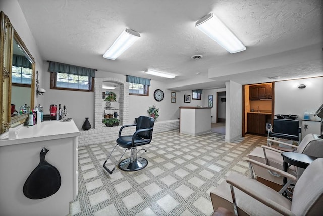 5124 W Ridge Rd, Erie, PA 16506 - miscellaneous room with a textured ceiling and light floors