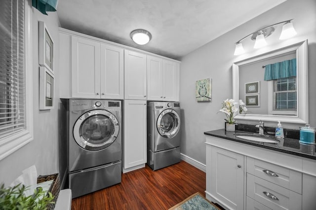 5124 W Ridge Rd, Erie, PA 16506 - laundry room featuring washer and clothes dryer, cabinet space, and dark wood-style floors