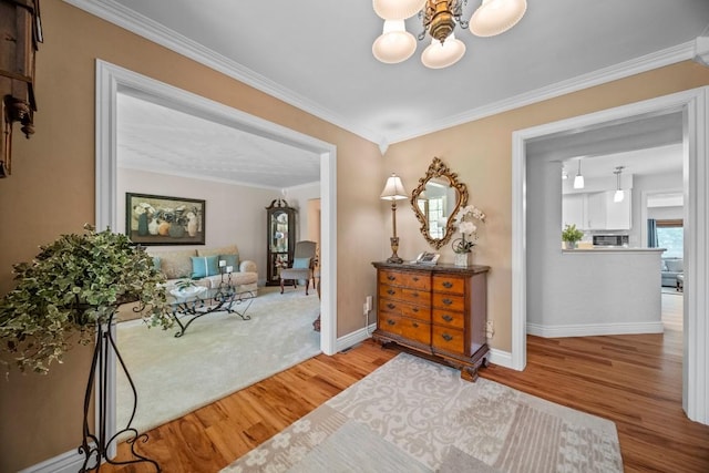 5124 W Ridge Rd, Erie, PA 16506 - foyer featuring wood finished floors, a chandelier, and ornamental molding