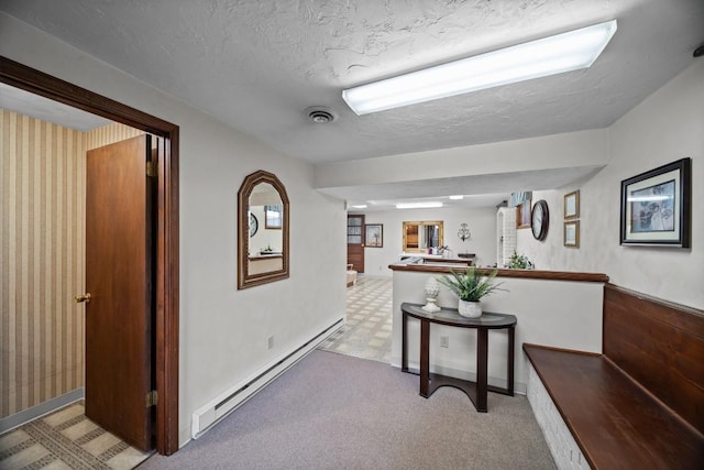 5124 W Ridge Rd, Erie, PA 16506 - hall with a baseboard heating unit and a textured ceiling